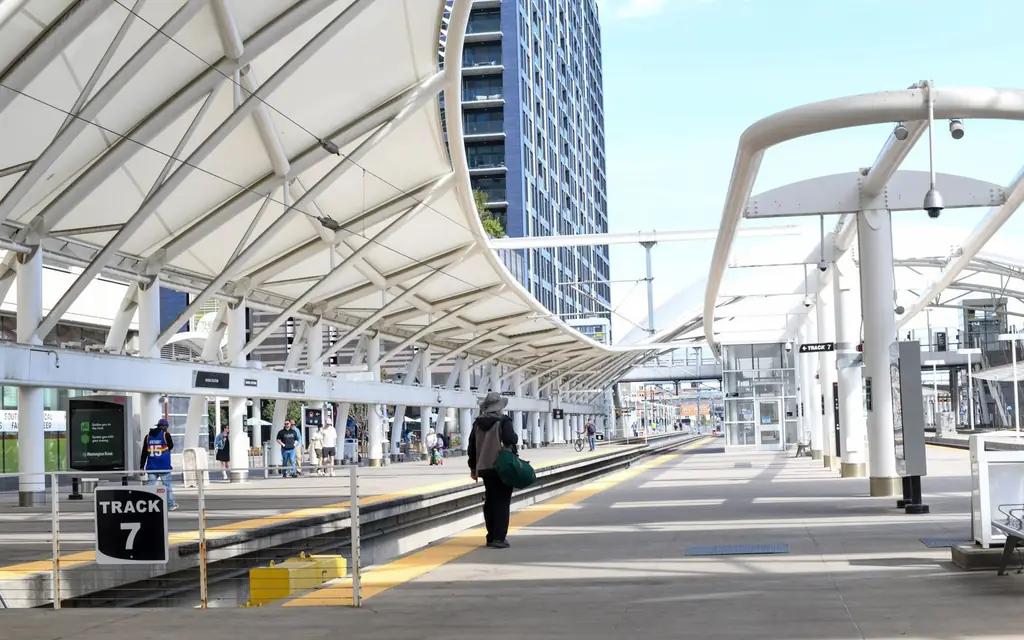 A sunny day captures the sleek design of Denver Union Station's modern platform.